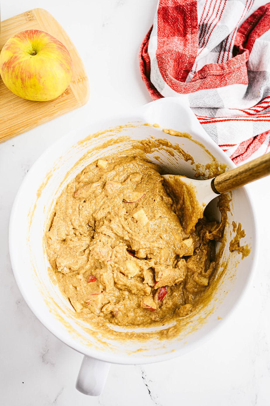 Overhead image of healthy apple muffin batter, ready to fill muffin tins