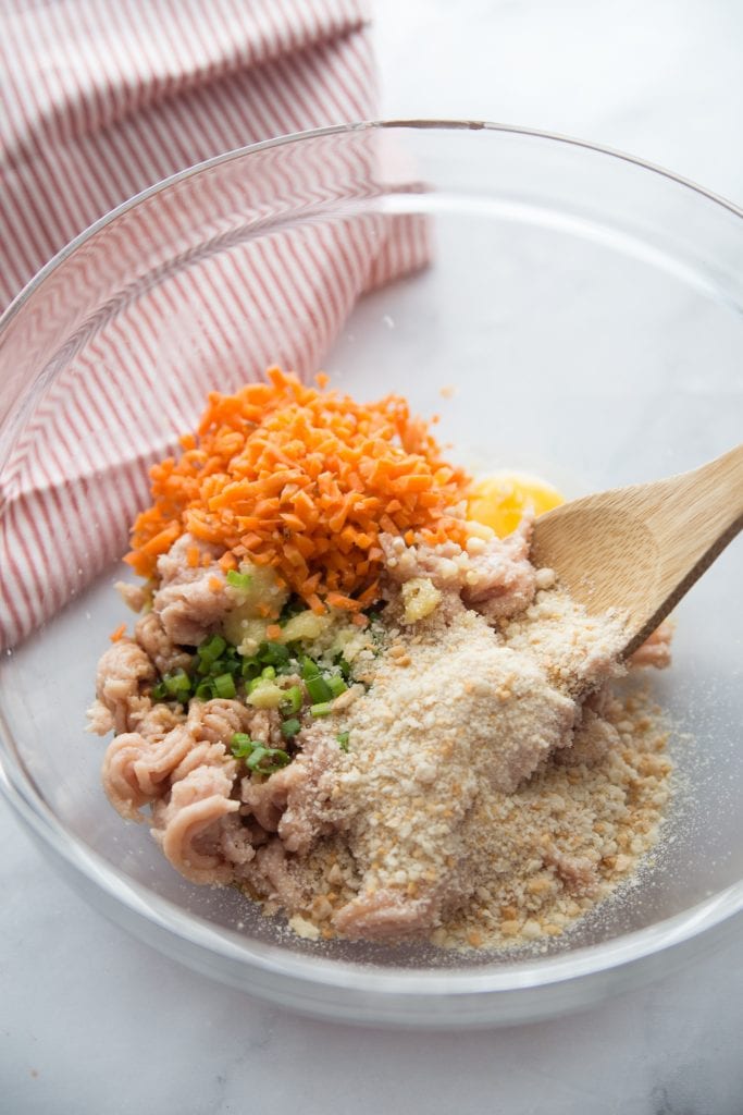 A bowl of ingredients for Asian Chicken Meatballs 