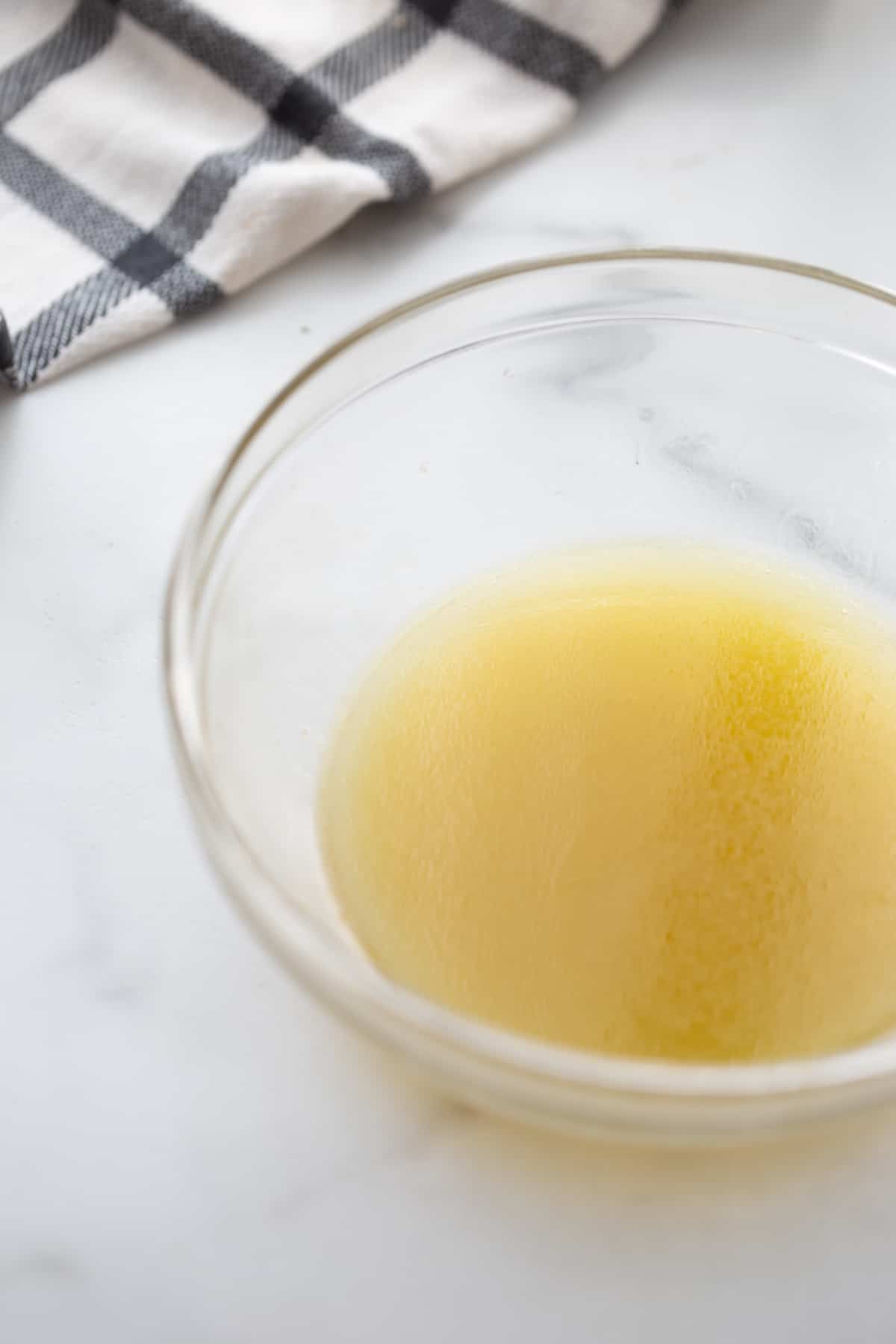 Salad dressing in a glass bowl