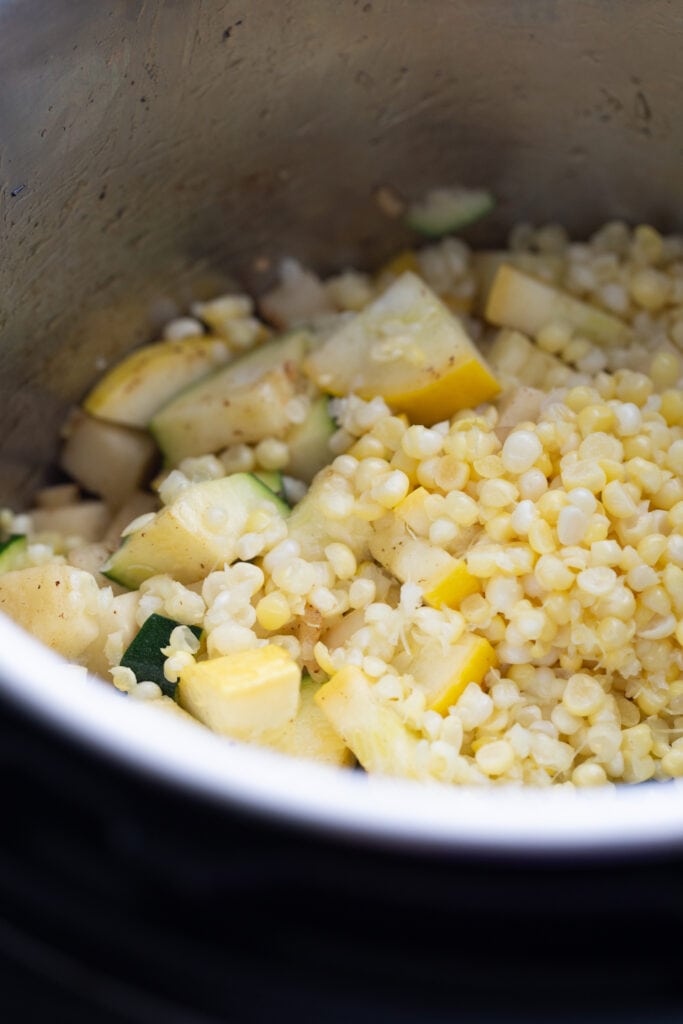 Corn and zucchini in an instant pot inner liner 