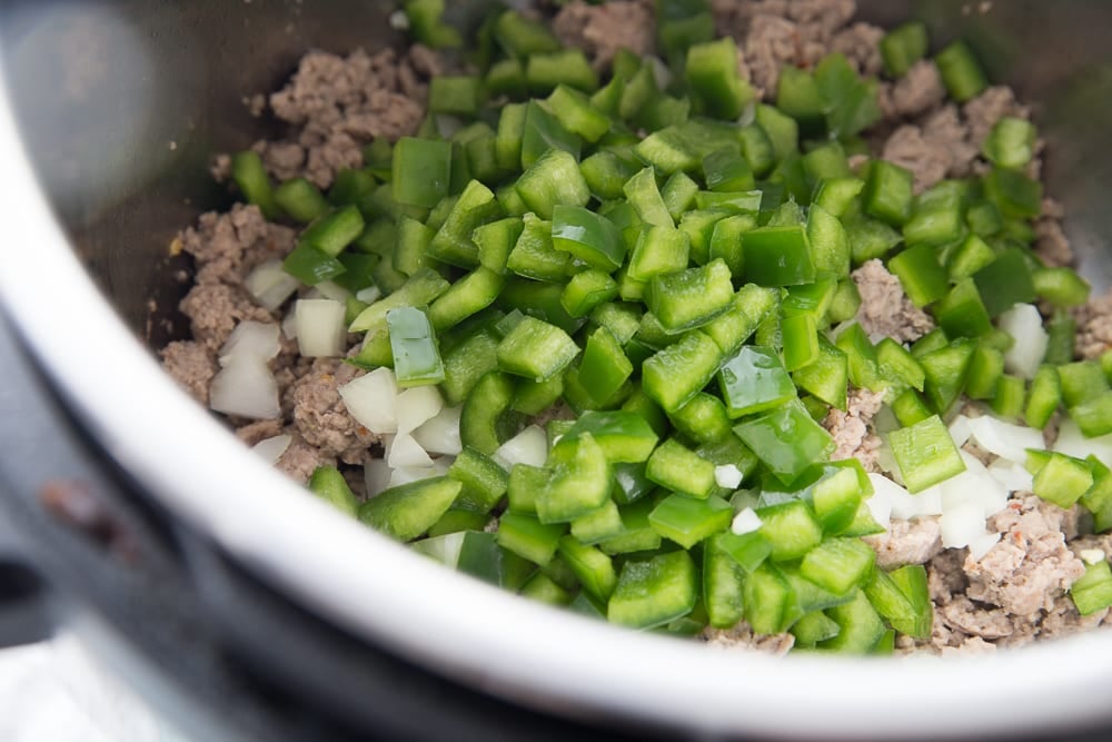 Instant Pot with sausage, onions, and peppers